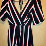 Trixxi Black Romper with Bold White and Red Stripes Photo 0