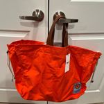 MAISON KITSUNE Orange Surf Drawstring Top Tote Bag Photo 5