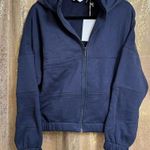 TAVI Noir Navy Blue Thick Warm Studio To Street Full Photo 0
