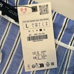 ZARA 
STRIPED TROUSERS WITH TURN-DOWN WAIST Photo 7