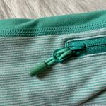Lululemon Size 6 Turbo Running Short in white with a mint green waistband Photo 7
