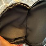 Sleek Black Leather Backpack with Adjustable Strap Photo 3