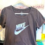 Nike  Tee Women's Sports T-shirt size L. Photo 1