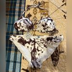 Roidal brand bikini swimsuit featuring a brown and white floral print NWT Size 12 Photo 0