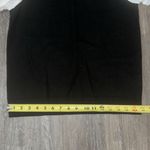 CeCe  Black Top with White Puff Sleeves Photo 7