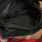 Black shoulder bag with studded accents Photo 2