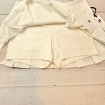 FILA NWT - - Women’s White Woven Pleated Skort - Size Large. Photo 3