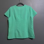 FIGS  Casma three pocket scrub top in surgical green  Photo 4
