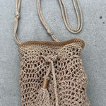 The Sak Brown Golden Crocheted Woven Tasseled Bucket Bag Medium Sized Photo 0