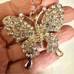 Gold tone butterfly rhinestone hang tag/keychain Photo 2
