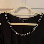 Coco Bianco  sleeveless, black sheath dress with gold chain detail Photo 3
