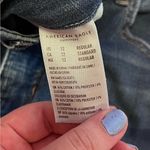 American Eagle  Ultra High-Rise Super Skinny Ripped Denim Blue Jeans Photo 6