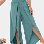 Halara 114.- HighWaisted Back Waistband Pocket Palazzo Flowy Split Wide Leg Photo 1