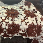 A brown and white long Photo 0