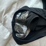 Black one piece with open sides Photo 5