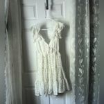 Trixxi  Floral Ruffle babydoll mini Dress back cut out back tie sz M Photo 1