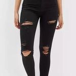 American Eagle super high-rise black jeggings distressed knee skinny jeans Photo 0