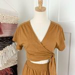 Free People  Fauna Jersey Knit Wrap Romper Short Sleeve Mustard Size XS NWT Photo 1