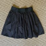If It Were Me  Black Pleated Skirt with Built in Shorts Photo 0