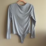 EXPRESS baby blue twist front bodysuit Size M Photo 1