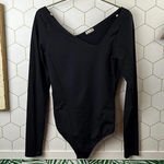Free People  Black Abbie Asymmetrical Bodysuit Size - Size - Medium Photo 0