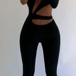Sexy Asymmetrical Jumpsuit in Black Size M Photo 0