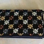 Edgy Black and Gold Skull Clutch Photo 0