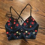 Lulumari Embroidered Wrap Top Photo 0