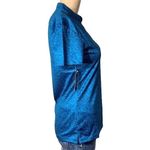 Nike  Womens Victory Golf Polo Shirt Dri Fit Standard Fit Animal Print Teal Blue Photo 7