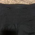 Athleta Size Small Peak Hybrid Fleece Tight in Black Photo 4