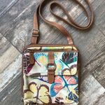 Fossil adjustable multi pocket iPad crossbody purse bag Photo 1