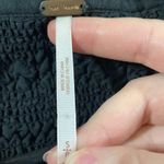 Free People  black Ruffle me up ruffled smocked detail front tie top size S Photo 12