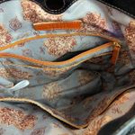 Hobo International Shoulder Bag Black Polished Leather Bucket Brown Piping Trim Photo 11