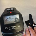 Moissanite 3/4 of a carrot platinum over sterling silver with gold. Size 10 1/4. Photo 1