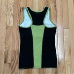 Nanette Lepore So Sporty a brand under . It features a black body with green trim Photo 4