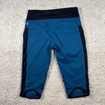 Fabletics  Blue Black Athletic Leggings Capri Cropped Zip Pocket Womens Size S Photo 5