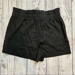 Socialite  Black High Waisted Tie Front Pocket Shorts. Size Large. Photo 10