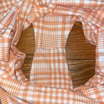 Stone Fox Swim Stone fox orange and white one shoulder one piece Photo 2