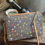 Michael Kors Authentic  leather/canvas airplane prints Crossbody Bag Photo 0