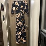 Everly Floral Black Wrap Dress Photo 1