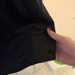 Forever 21  black satin dress with a white bow accent Photo 6