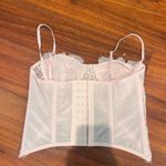 Urban Outfitters  pink out from under corset top Photo 1