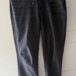 Paige Women's High-Rise Black Tie-Waist Jeans with Fringe Ankles Photo 0