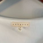 Francesca’s boutique white ruffle short‎ sleeve top Photo 2