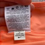 Nike  Women's Athletic Dry Fit Skort - Orange and Burgundy Photo 3