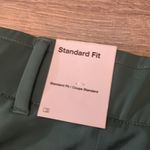 Nike  green standard fit golf shorts size small Photo 6