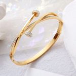 Unique Gold Nail Pattern Cross & Rhinestone Decor Stainless Steel Bracelet Photo 1