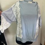 Andthewhy lace trim on sleeves unique pastel blue Photo 0