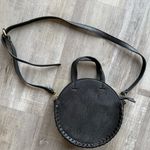 Free People  Round Vegan Leather Crossbody Bag in Black Photo 0