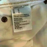 American Eagle  white high rise distressed shorts concert festival cowgirlcore Photo 5